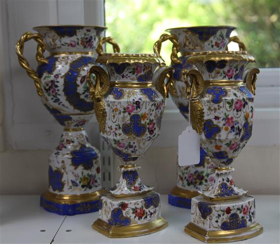 Two pairs of Paris porcelain two handled vases, mid 19th century, 28cm